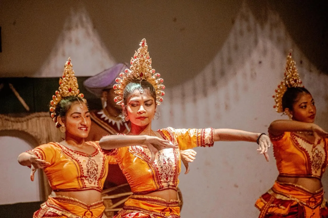 Traditional dancers in vibrant costumes.
