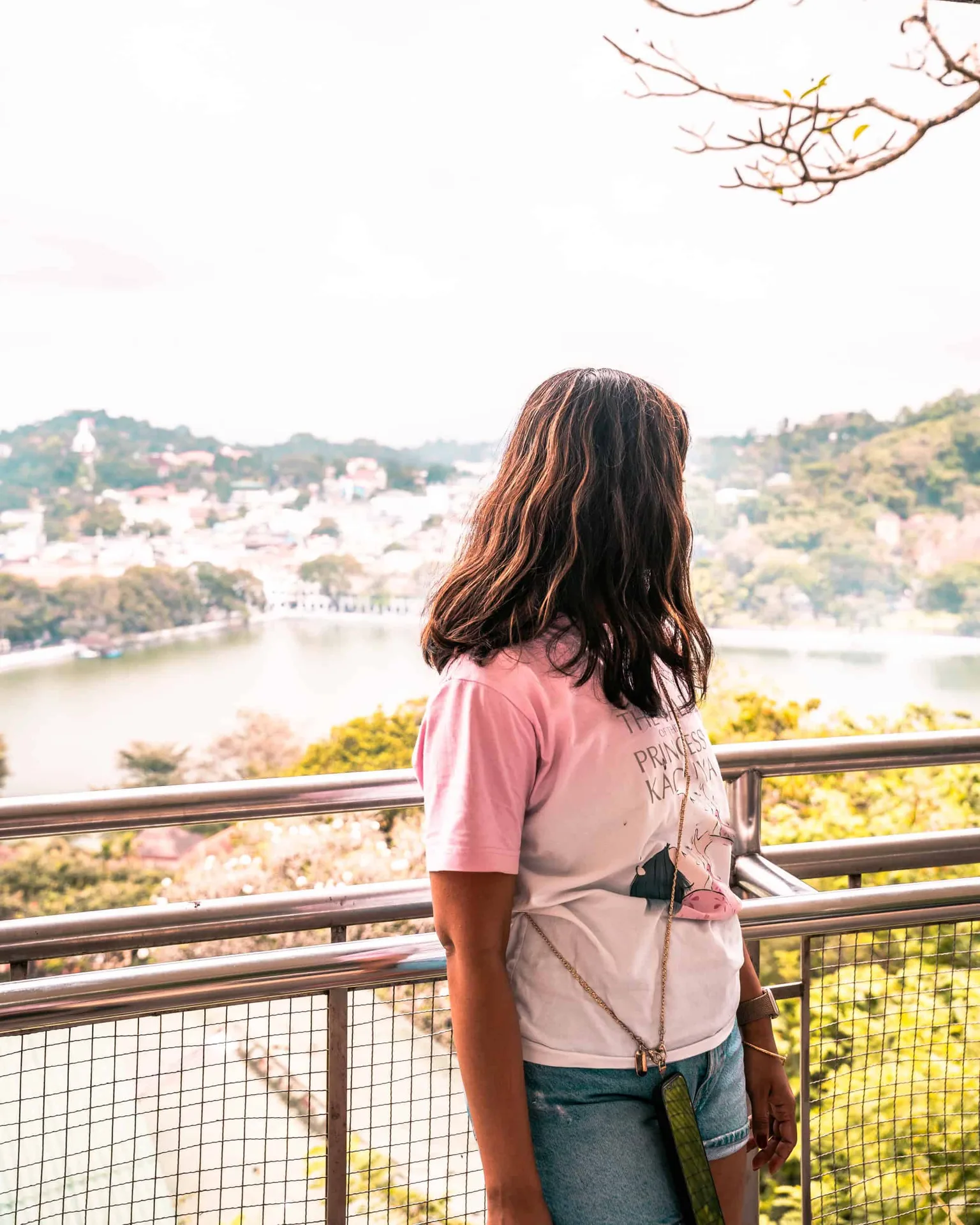 Person overlooking scenic lake view