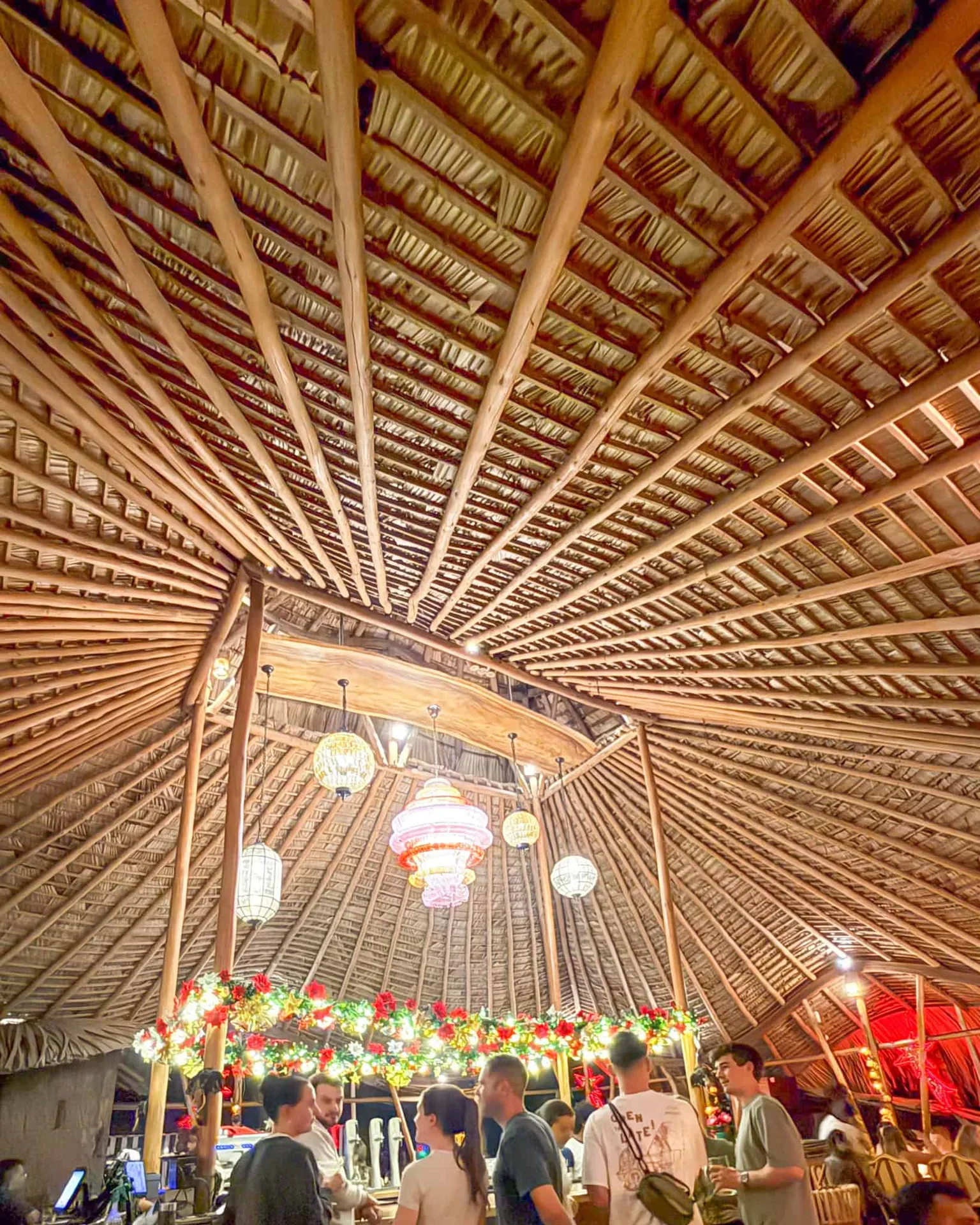 Rustic interior with bamboo ceiling.