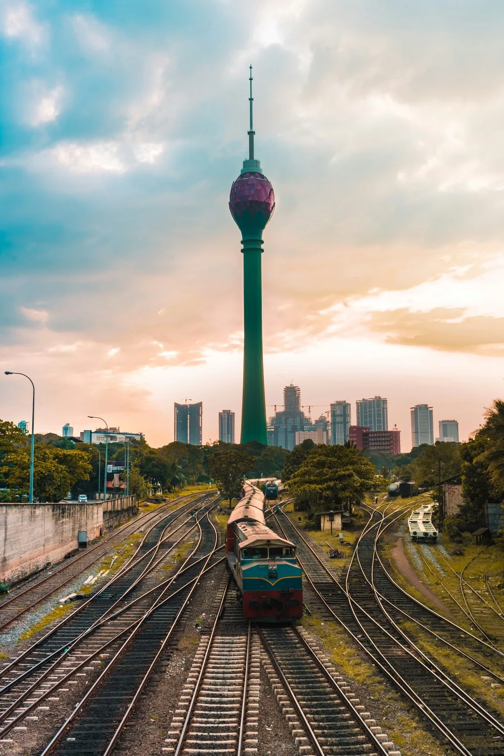 Train near Colombo's iconic tower