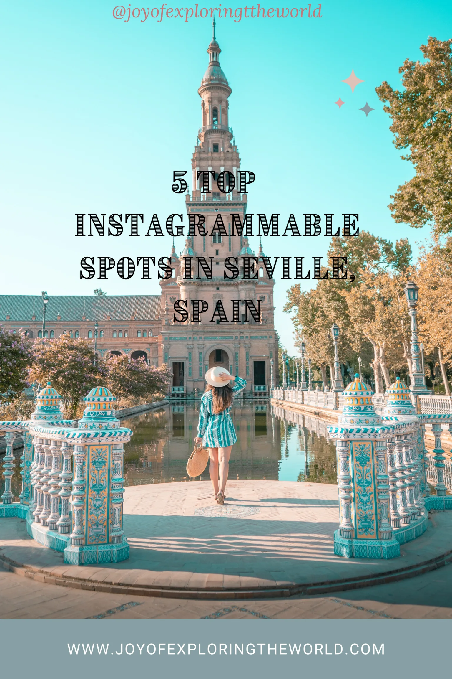 Woman in a summer dress and sunhat standing at a tiled balustrade overlooking the Plaza de España's tower and reflective canal in Seville, Spain.