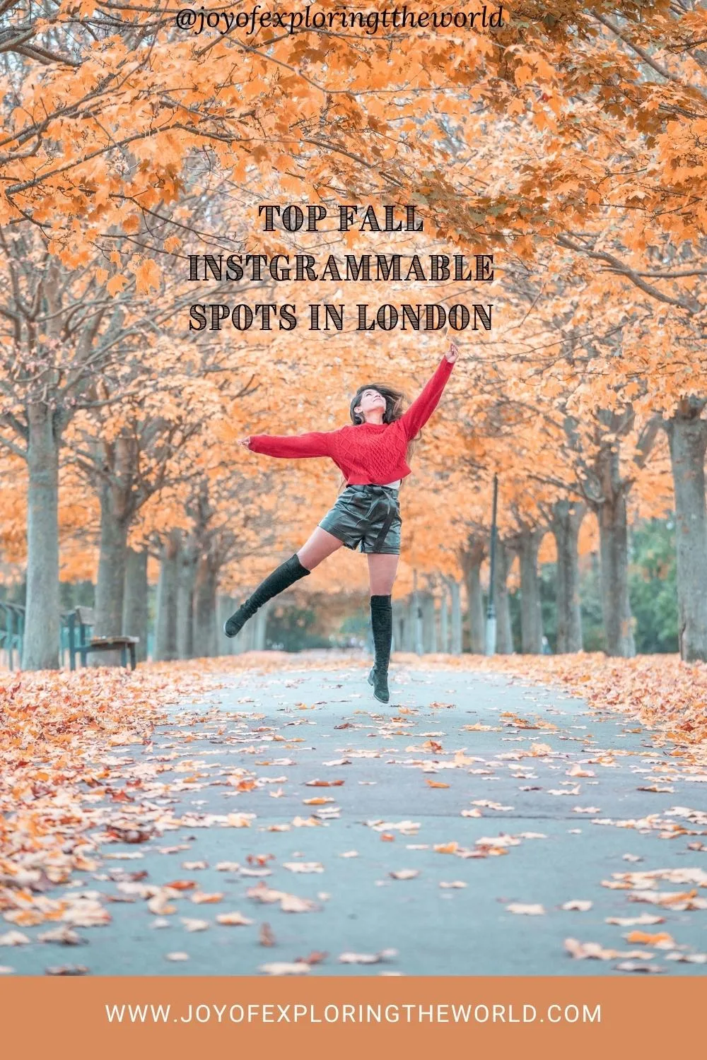 Woman in a red sweater joyfully leaping on a leaf-strewn path lined with orange autumn trees in London.