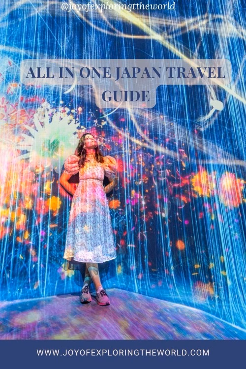 Woman standing in a colourful immersive art installation with the text All in One Japan Travel Guide