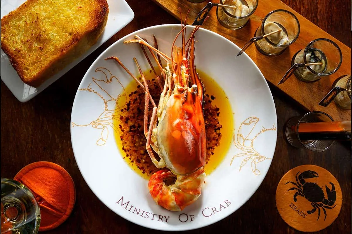 Crab dish with sides and drinks