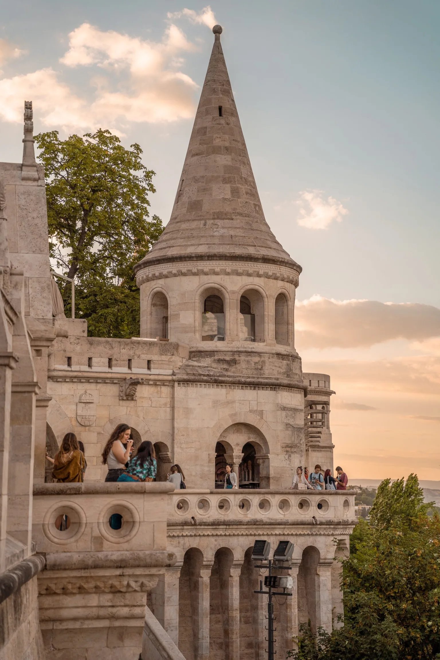 Historic tower with scenic sunset view.