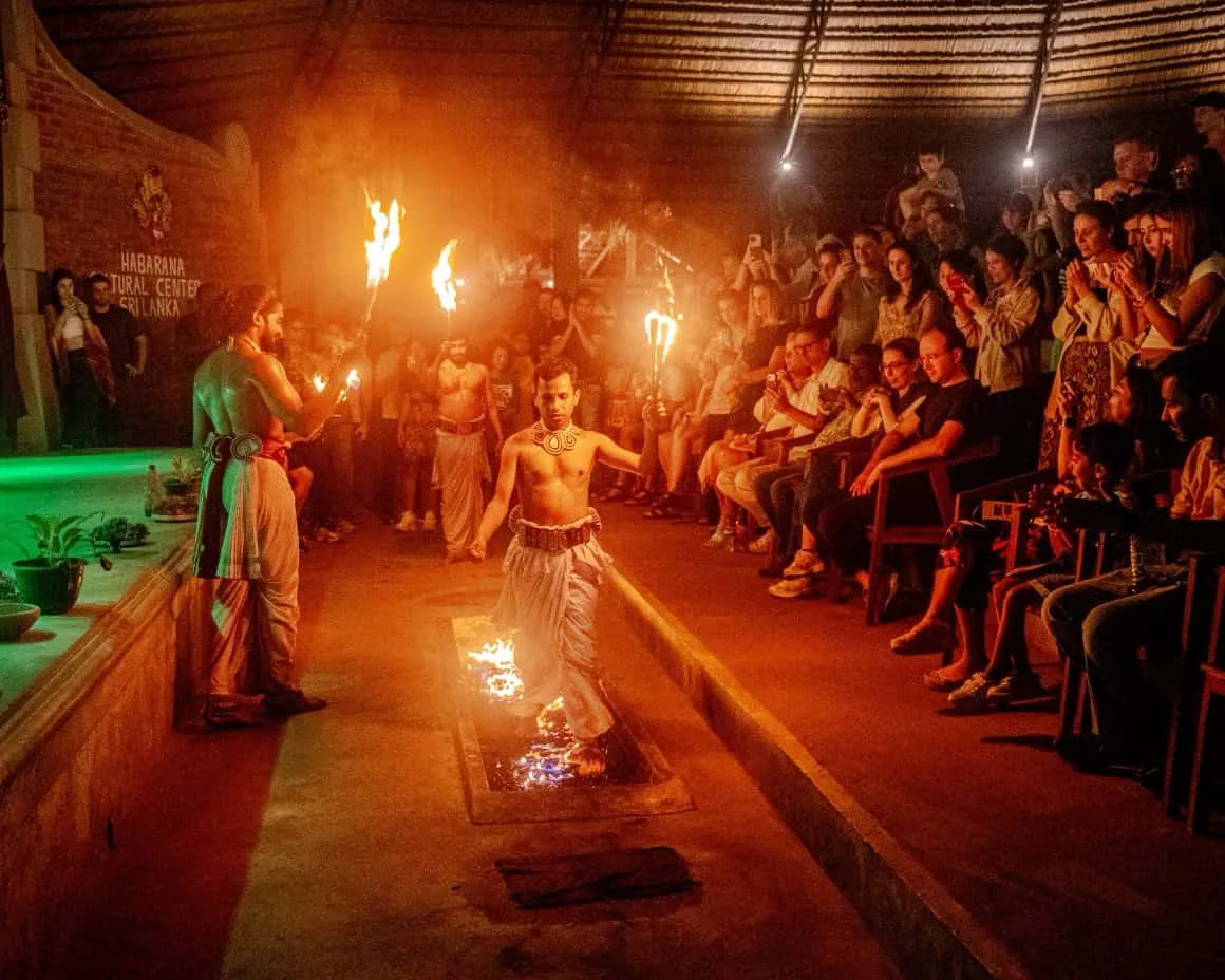 Fire performers entertaining an audience.